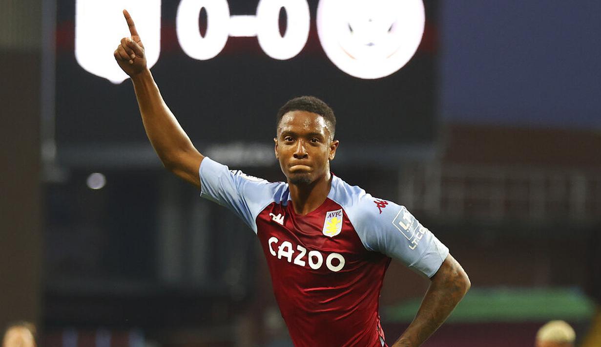 Pemain Aston Villa, Ezri Konsa, melakukan selebrasi usai mencetak gol ke gawang Sheffield United pada laga Liga Inggris di Stadion Villa Park, Senin (21/9/2020). Aston Villa menang dengan skor 1-0. (Julian Finney/Pool via AP)