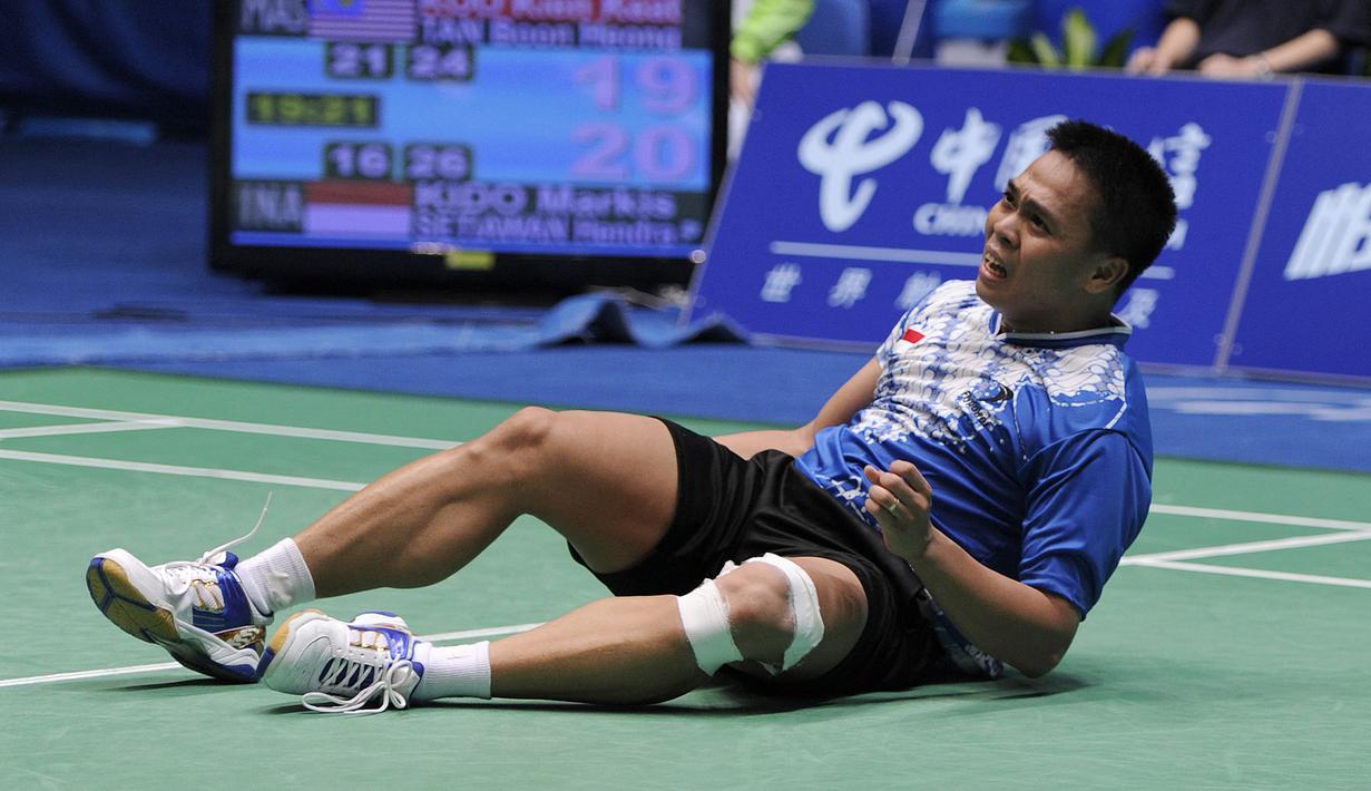 Markis Kido/Hendra Setiawan menang lewat rubber game, 16-21, 26-24, 21-19. (Foto: AFP/Liu Jin)
