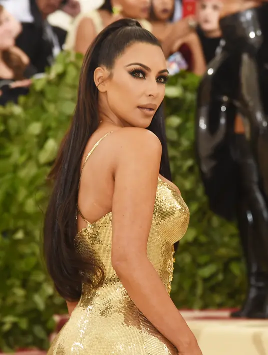 Ini adalah tahun kedua Kim Kardashian hadir tanpa Kanye West secara berturut-turut. (JAMIE MCCARTHY / GETTY IMAGES NORTH AMERICA / AFP)