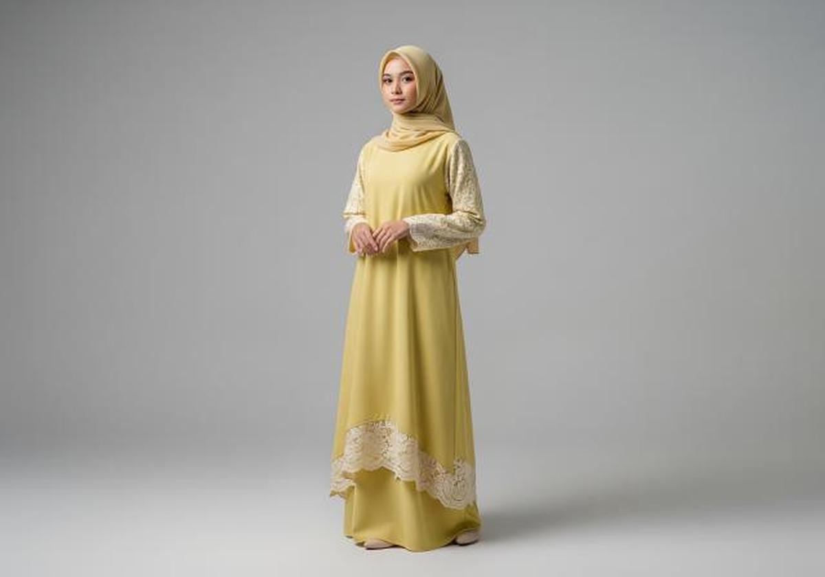 Gamis Tunik dengan Detail Renda Tipis/Model Gamis Tunik Ala Gen Z untuk Ramadhan 2026 (Sumber; gemini.com)