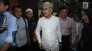Terdakwa suap perizinan tambang nikel di dua kabupaten di Sulawesi Tenggara, Nur Alam keluar ruang sidang usai mengikuti pembacaan putusan di Pengadilan Tipikor, Jakarta, Rabu (28/3). Nur Alam dihukum 12 tahun penjara. (Liputan6.com/Helmi Fithriansyah)