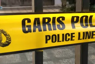 Ilustrasi - Rumah korban pembunuhan dipasang garis polisi (Merdeka.com / Ronald)