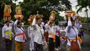 Upacara Melasti dilaksanakan setahun sekali, yang merupakan rangkaian dari Hari Raya Nyepi. (JUNI KRISWANTO/AFP)