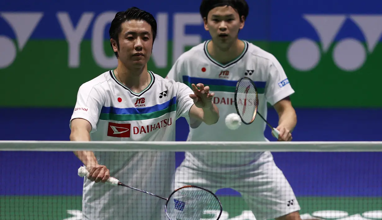 Hiroyuki Endo. Pemain ganda putra Jepang ini dipanggil "Haji Endo" oleh para fans bulu tangkis Indonesia. Bukan tanpa alasan, karena di jersey memang namanya disingkat menjadi H. Endo, dan di Indonesia identik dengan gelar Haji, jadilah ia dipanggil Haji Endo. (AFP/Adrian Dennis)