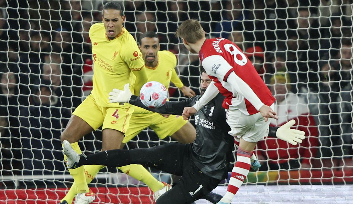 Namun pada akhirnya, Arsenal harus menerima kekalahan 0-2 ini. Serangkaian percobaannya untuk menembus pertahanan the Reds terus mengalami kegagalan sampai wasit meniupkan peluit panjang tanda berakhirnya permainan. (AP/Ian Walton)