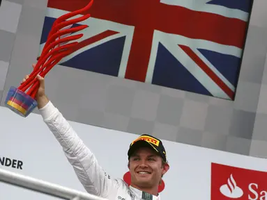 Pembalap F1 dari tim Mercedes, Nico Rosberg, sukses menempati podium utama GP Jerman di Sirkuit Hockenheim, (20/7/2014). (REUTERS/Michael Dalder)