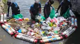 Sebagai bentuk tanggung jawab sosial dan lingkungan (TJSL), BRI melalui BRI Peduli menghadirkan program &ldquo;Jaga Sungai, Jaga Kehidupan&rdquo; bekerja sama dengan Yayasan Sungai Watch. Program ini fokus memulihkan kebersihan sungai, salah satunya di Tukad Badung, Denpasar, dengan memasang jaring penahan sampah dan mencegah limbah rumah tangga masuk ke laut. (Sumber: BRI Peduli)