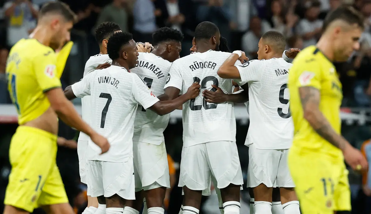 Dengan kemenangan ini posisi Real Madrid di klasemen sementara LaLiga 2024/2025 tidak berubah. Saat ini, Real Madrid berada di posisi dua dengan 21 poin dari sembilan pertandingan. Sementara, tempat ketiga diduduki Villarreal. (OSCAR DEL POZO/AFP)