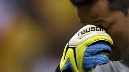 Ekspresi penjaga gawang Brasil, Julio Cesar, usai dipermalukan Belanda 0-3 di laga perebutan tempat ketiga Piala Dunia 2014 di Stadion Nasional Brasilia, (13/7/2014). (REUTERS/Ueslei Marcelino)
