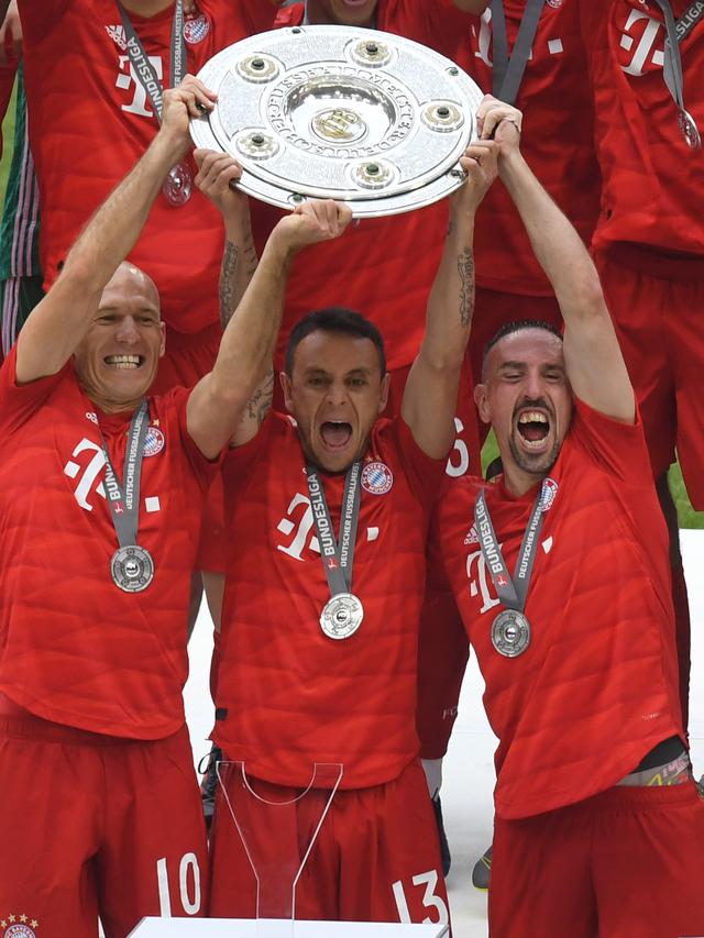 Tiga pemain Bayern Munchen, Arjen Robben, Rafinha, dan Franck Ribery.