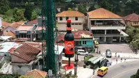 Sempat Menghilang, Tugu Botol Kecap Raksasa Kembali Berdiri di Kawasan Puncak Cianjur