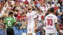 Reaksi Olivier Giroud saat bertanding melawan Sassuolo pada pertandingan lanjutan Liga Serie A Italia di stadion Mapei - Citta del Tricolore di Reggio Emilia (30/8/2022). Dengan hasil imbang ini AC Milan berada di posisi 3 dengan 8 poin. (Massimo Paolone / LaPresse via AP)