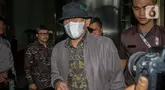 Anggota VI Badan Pemeriksa Keuangan (BPK), Pius Lustrilanang saat meninggalkan gedung Merah Putih Komisi Pemberantasan Korupsi (KPK), Jakarta, Jumat (1/12/2023). (Liputan6.com/Angga Yuniar)
