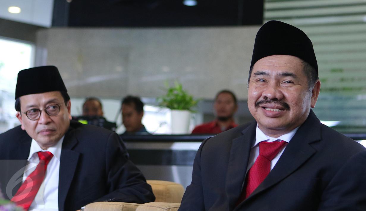 Ketua PPATK Kiagus Ahmad Badaruddin dan Wakil Ketua, Dian Ediana Rae (kiri) memberi keterangan usai sertijab di Gedung PPATK, Jakarta, Rabu (26/10). Dalam keteranganya Kiagus menjelaskan akan memperhatikan penanganan TPPU. (Liputan6.com/Angga Yuniar)