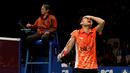 Ekspresi Tontowi Ahmad/Liliyana Natsir ganda campuran Indonesia saat bertanding melawan Zhang Nan/Zhao Yunlei di semifinal BCA Indonesia Open Premier Super Series 2015 di Istora Senayan Jakarta. (Peksi Cahyo/Bola.com)