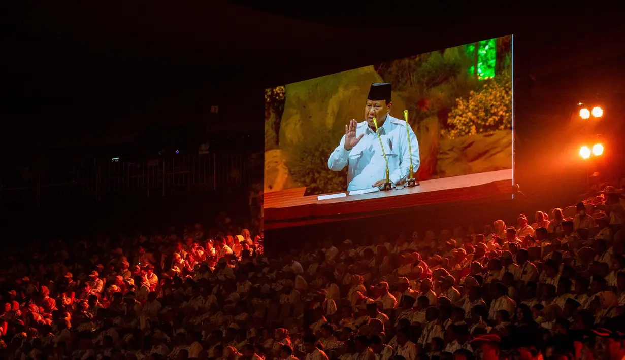 Perayaan ini dihadiri sejumlah tokoh politik, mulai dari jajaran menteri Kabinet Merah Putih hingga ketua umum partai politik yang tergabung dalam Koalisi Indonesia Maju. (ADITYA AJI/AFP)