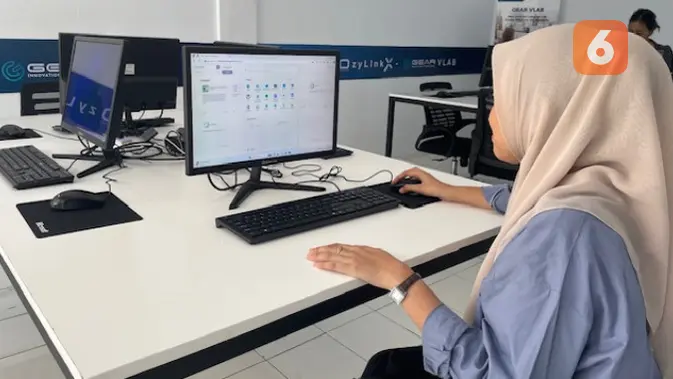 <p>Axioo dan GEAR Computer resmikan lab virtual pertama di Indonesia dengan teknologi IDV untuk atasi buta teknologi dan keterbatasan dana sekolah. (Liputan6.com/ Agustin Setyo Wardani)</p>