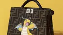 Kesan eklektik terlihat begitu nyata dengan koleksi klasik Fendi berpadu animasi Pokémon. [Foto: Fendi.dok]