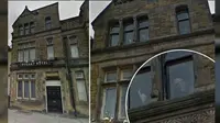 Seorang pria mendapati wajah menyeramkan di jendela Stuart hotel di Liverpool, Inggris. (express.co.uk)
