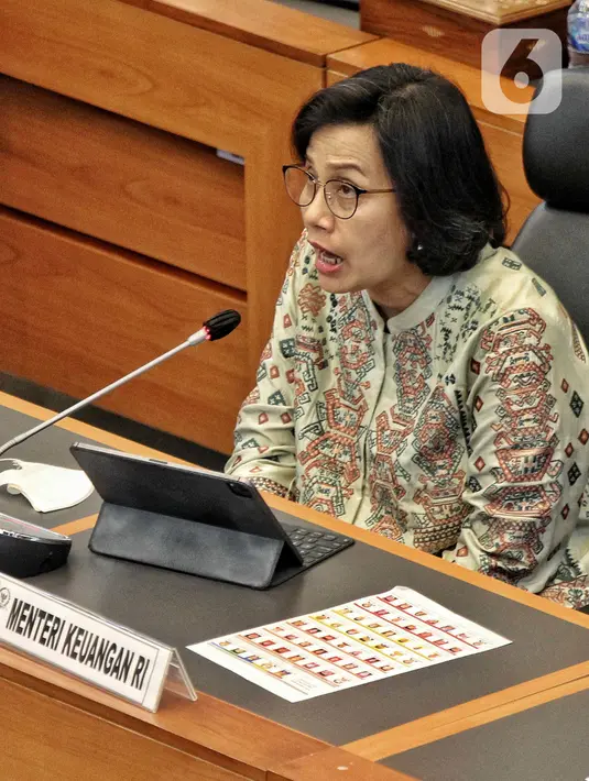 <p>Menteri Keuangan Sri Mulyani saat mengikuti rapat kerja Pemerintah dengan Banggar DPR di Kompleks Parlemen, Senayan, Jakarta, Rabu (14/9). Dalam rapat tersebut membahas postur sementara RUU APBN TA 2023. (Liputan6.com/Angga Yuniar)</p>