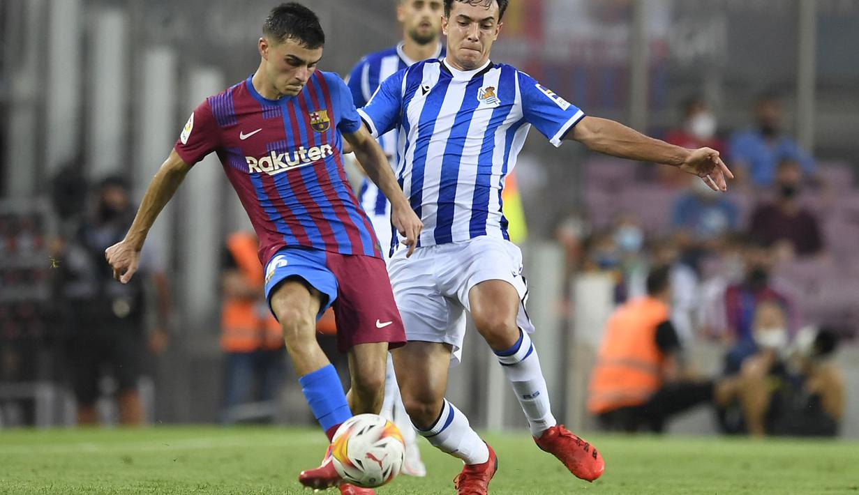 Pedri merupkan pemain muda berbakat Barcelona yang menempati urutan kedua pemain berbanderol tertinggi, yaitu 80 juta euro. Namun bisa saja ia bernasib sama dengan sang bintang Barcelona, Lionel Messi yang tidak diperpanjang oleh klub dan meninggalkan Blaugrana secara gratis. (Foto: AFP/Josep Lago)