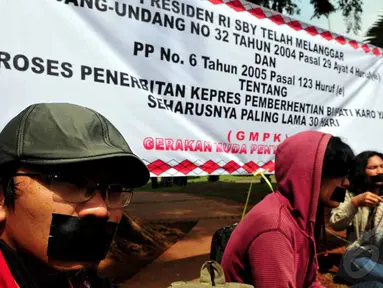 Pengungsi Korban gunung Sinabung melakukan aksi Demo Di depan Istana Negara, Jakarta, Selasa (17/6/2014) (Liputan6.com/Johan Tallo) 