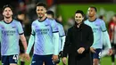 Hingga akhir pertandingan skor 3-1 untuk keunggulan Arsenal atas Brentford tidak berubah. Kemenangan atas Brentford mengangkat posisi Arsenal ke peringkat dua klasemen dengan poin 39 dari 19 pertandingan. (JUSTIN TALLIS/AFP)