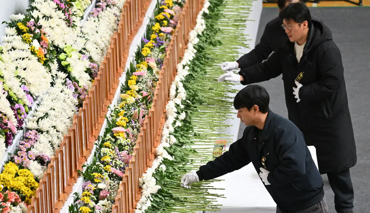 Peristiwa itu menewaskan 179 dari 181 penumpang. (JUNG YEON-JE/AFP)