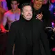 Tim Curry pada 2010 di Los Angeles. (KEVIN WINTER / GETTY IMAGES NORTH AMERICA / Getty Images via AFP)