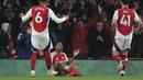 Pemain Arsenal, Myles Lewis-Skelly melakukan selebrasi setelah mencetak gol ketiga timnya ke gawang Manchester City dalam laga lanjutan Liga Inggris 2024/2025 di Emirates Stadium, London, Minggu (03/02/2025). (AP Photo/Alastair Grant)
