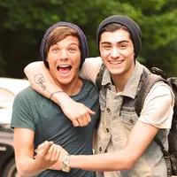 Zayn Malik dan Louis Tomlinson jadi sorotan fans One Direction gara-gara berseteru di Twitter.