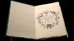 Salah satu dari tujuh eksemplar buku tulisan tangan dan digambar oleh J.K. Rowling di rumah lelang Sotheby, London, 9 Desember 2016. Buku berjudul The Tales of Beedle the Bard itu terjual 467 ribu dolar AS atau sekitar Rp6,2 miliar. (Justin TALLIS/AFP)