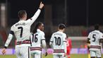 Striker Portugal, Cristiano Ronaldo (kiri) melakukan selebrasi usai mencetak gol kedua Portugal ke gawang Luksemburg dalam laga Kualifikasi Piala Dunia 2022 Zona Eropa Grup A di Josy Barthel Stadium, Luksemburg, Selasa (30/3/2021). Portugal menang 3-1 atas Luksemburg. (AP/Olivier Matthys)