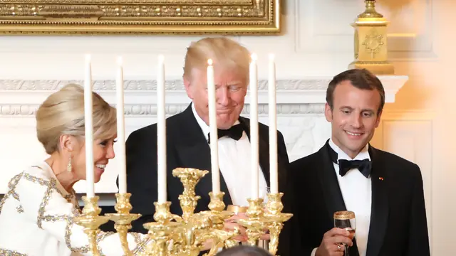 Malam malam kenegaraan Presiden Prancis Emmanuel Macron dan istrinya bersama Donald Trump di Amerika Serikat. (AFP)