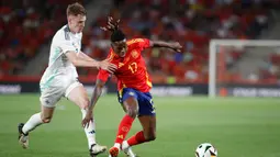 Sempat tertinggal lewat di awal laga, timnas Spanyol bangkit dan mendominasi jalannya pertandingan. (JAIME REINA/AFP)