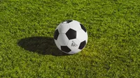 Ilustrasi bola. (Photo by Wesley Tingey on Unsplash)