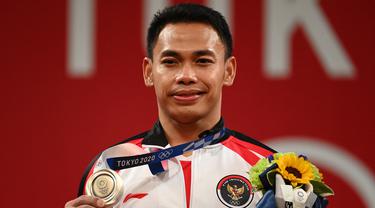 Lifter Indonesia, Eko Yuli Irawan meraih medali perak di Olimpiade Tokyo cabor angkat besi.