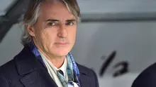 Inter Milan's coach from Italy Roberto Mancini looks on before the Italian Serie A football match Verona vs Inter Milan at the Bentegodi Stadium in Verona on February 7, 2016. GIUSEPPE CACACE / AFP 