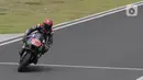 Pembalap Monster Energy Yamaha MotoGP, Fabio Quartararo saat sesi Warm Up MotoGP di Pertamina Mandalika International Street Sirkuit, Nusa Tenggara Barat, Minggu (20/3/2022). (Liputan6.com/Helmi Fithriansyah)