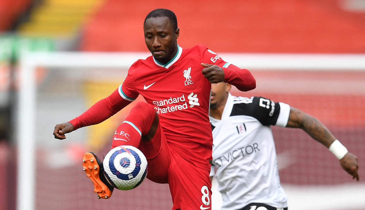 Naby Keita. Gelandang asal Guinea berusia 26 tahun ini telah memperkuat Liverpool sejak musim 2018/2019. Ia telah memperkuat The Reds dalam 77 laga dengan mencetak 7 gol dan 4 assist. Bersama Guinea mengoleksi 40 caps dan mencetak 8 gol. (Foto: AFP/Pool/Paul Ellis)