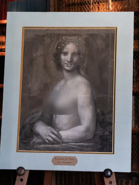 Lukisan 'Monna Vanna' atau dikenal dengan 'Mona Lisa Telanjang' ditunjukkan di Museum Conde, Chantilly, Prancis, Senin (11/3). 'Monna Vanna' diyakini diselesaikan di studio Da Vinci, kemungkinan besar adalah karya sang maestro. (Kenzo Tribouillard/AFP)