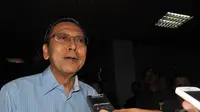 Boediono mengaku sempat membisiki Guru Besar Kehutanan dan Pertanian Universitas Gajah Mada (UGM) itu, Jakarta, Rabu (27/8/2014) (Liputan6.com/Miftahul Hayat)