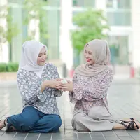 ilustrasi perempuan lebaran/Photo by Muhammad Faiz Zulkeflee on Unsplash