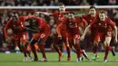Pemain Liverpool merayakan kemenangan 6-5 atas Stoke City lewat adu penalti dalam leg kedua semifinal Piala Liga Inggris di Stadion Anfield, Liverpool, Rabu (27/1/2016) dini hari WIB. (Action Images via Reuters/Carl Recine)