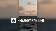 Seorang pria merekam penampakan objek misterius bercahaya yang terbang di atas laut. Diduga, benda misterius tersebut adalah UFO.