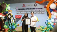 Selonia memecahkan rekor Museum Rekor Indonesia (MURI) dan bahkan disebut sebagai rekor dunia dengan menciptakan Konfigurasi Bendera Merah Putih dari rangkaian balon di kolam terdalam. (Ist).