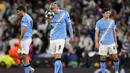 Sementara, tim racikan Pep Guardiola menelan pil pahit tersingkir dari Liga Champions 2025/2026. Tampak dalam foto, ekspresi striker Manchester City asal Norwegia, Erling Haaland, setelah timnya kebobolan gol saat pertandingan leg kedua 16 besar Liga Champions 2025/2026 melawan Real Madrid di Etihad Stadium, barat laut Inggris, pada Selasa 17 Maret 2026 waktu setempat atau Rabu (18/3) dini hari WIB. (Oli SCARFF/AFP)