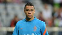 Gregory van der Wiel  kembali perkuat timnas Belanda (CHRISTOF STACHE / AFP)