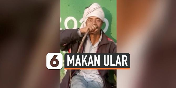 VIDEO: Viral, Pria Makan Ular Dalam Keadaan Utuh