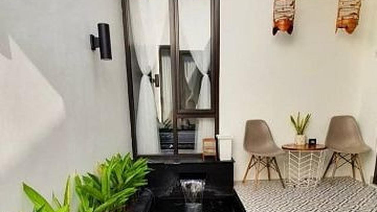<b>Desain Teras Belakang Rumah Dengan Kolam Ikan</b>